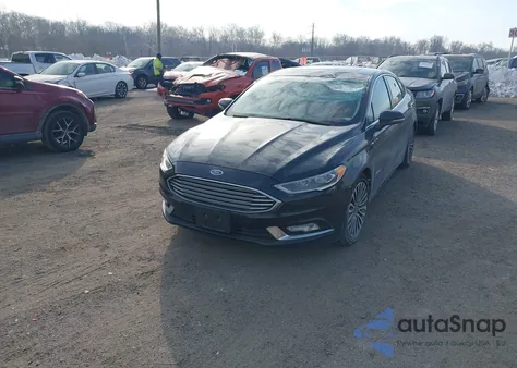 2017 Ford Fusion Hybrid Titanium z USA, uszkodzony, nr VIN 3FA6P0RU1HR359869